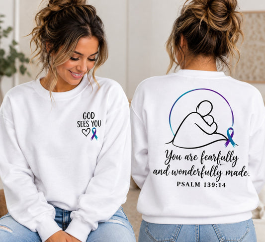 White Christian crewneck sweatshirt mockup with God Sees You chest design and Psalm 139:14 back design